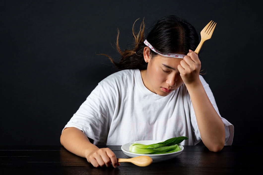 depressed-woman-hungry-from-dieting_1150-44268.webp.jpg